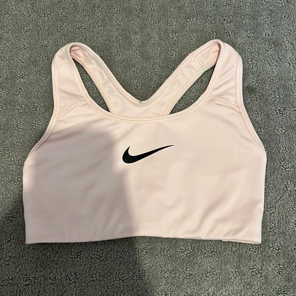 Black and pink Nike sports bra